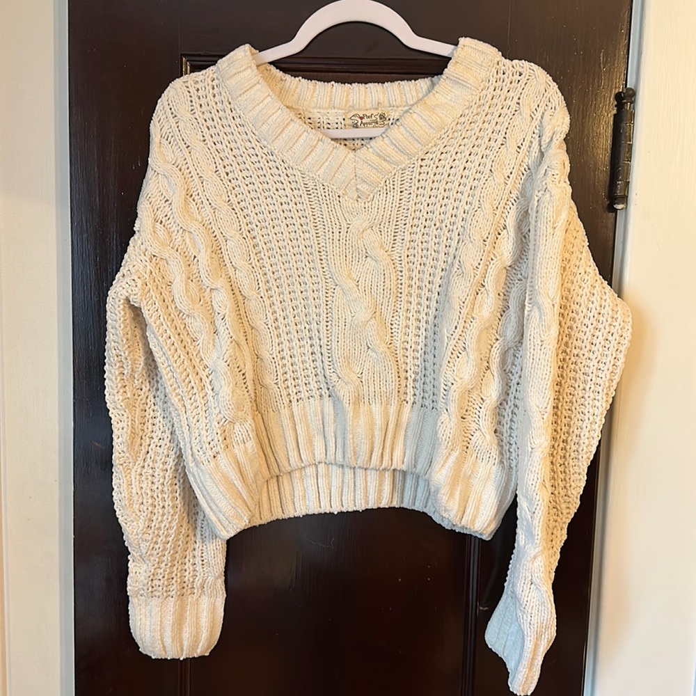 White sweater.